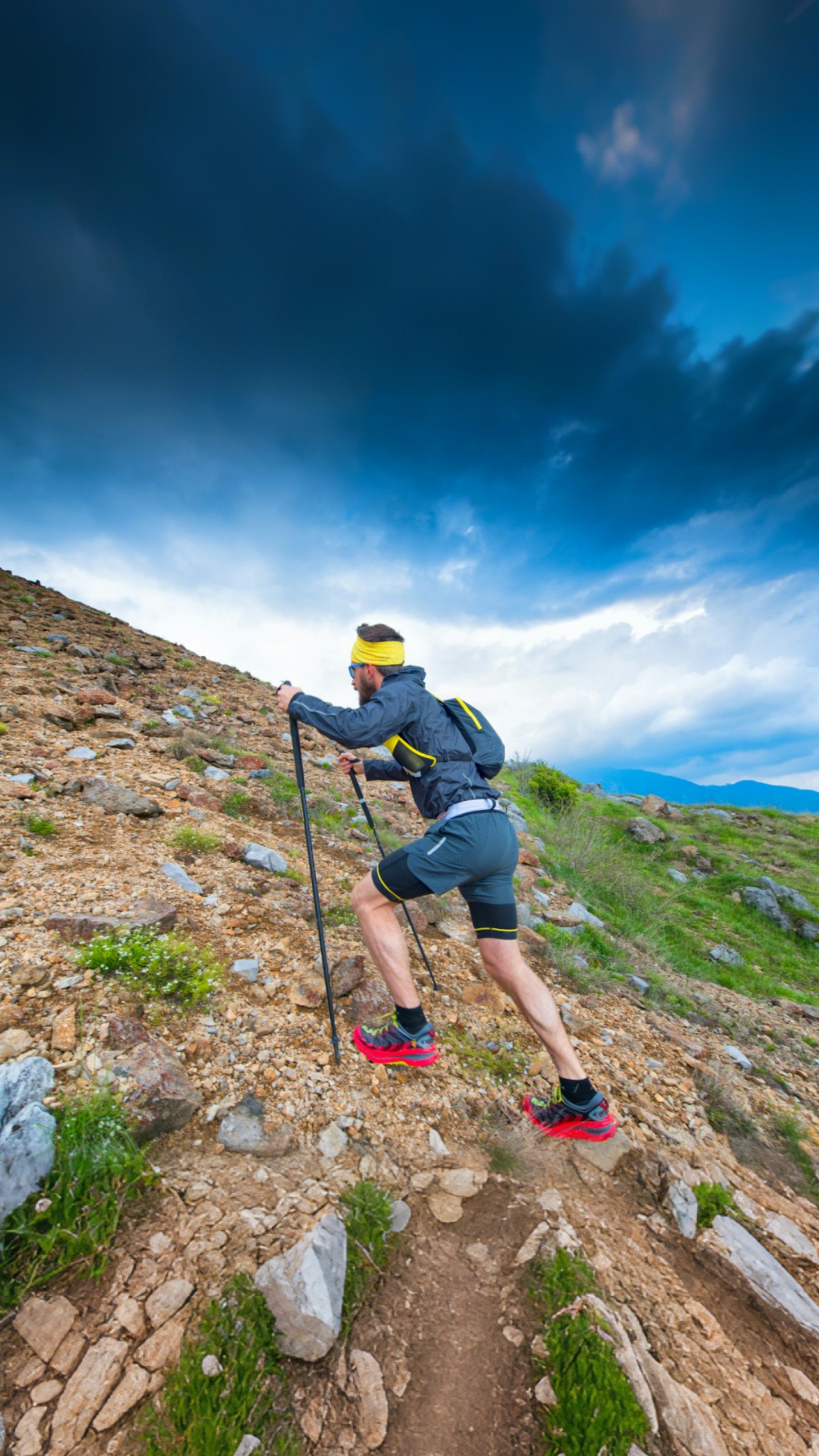 Climber Gripping the Peak
