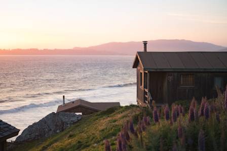 The Beach Chalet - A Coastal Log Home On The Ocean